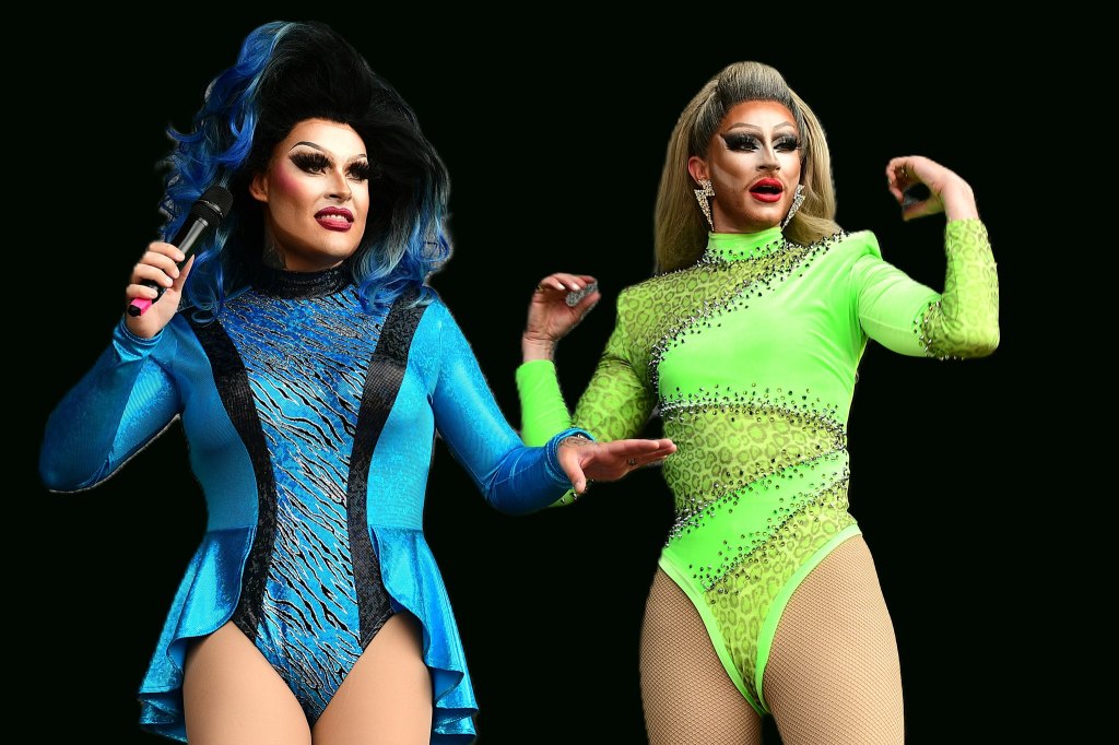 Two drag performers on stage, one in a blue sequined outfit and the other in a bright green outfit with animal prints, both displaying dramatic poses.